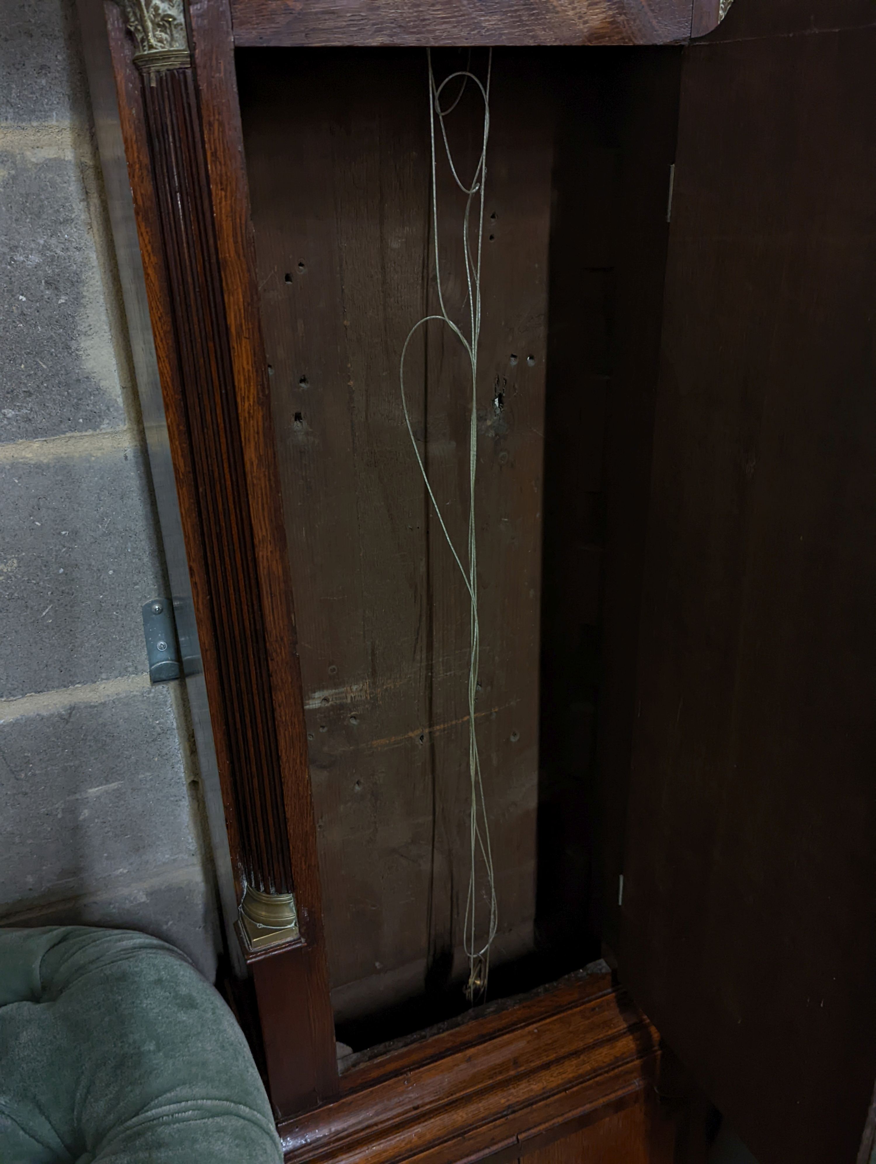 A George III oak cased 8 day longcase clock, height 237cm